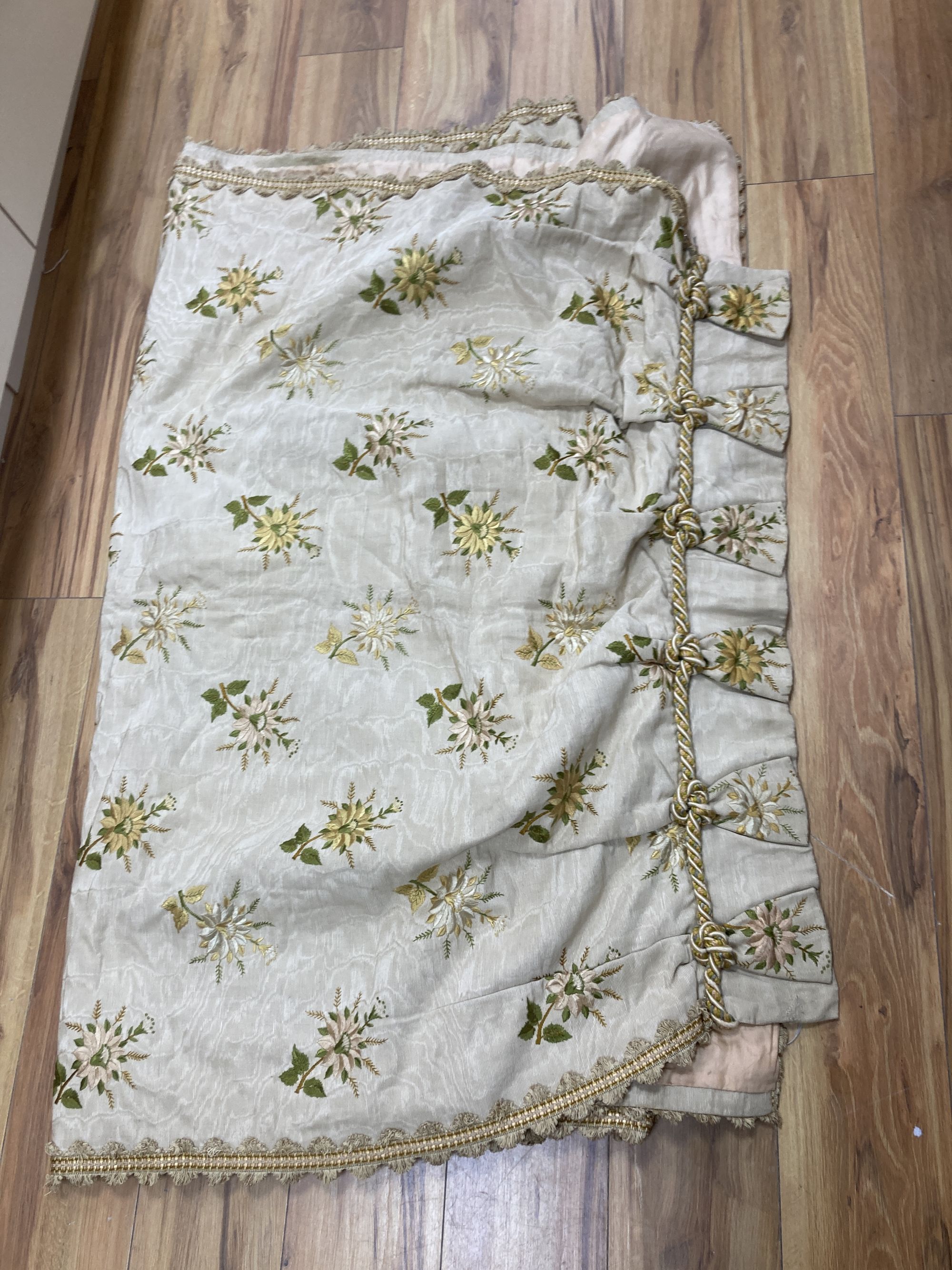 An Edwardian embroidered silk single curtain, 90cm wide at the top x 288cm long